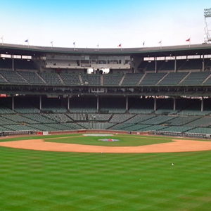 Wrigley Field seen from behind home plate, with the backstop netting rigged above the seats