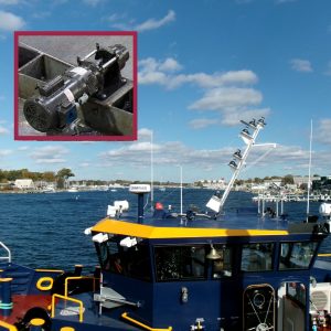 Columbia HD2000 Hoist being used to raise an antenna Mast